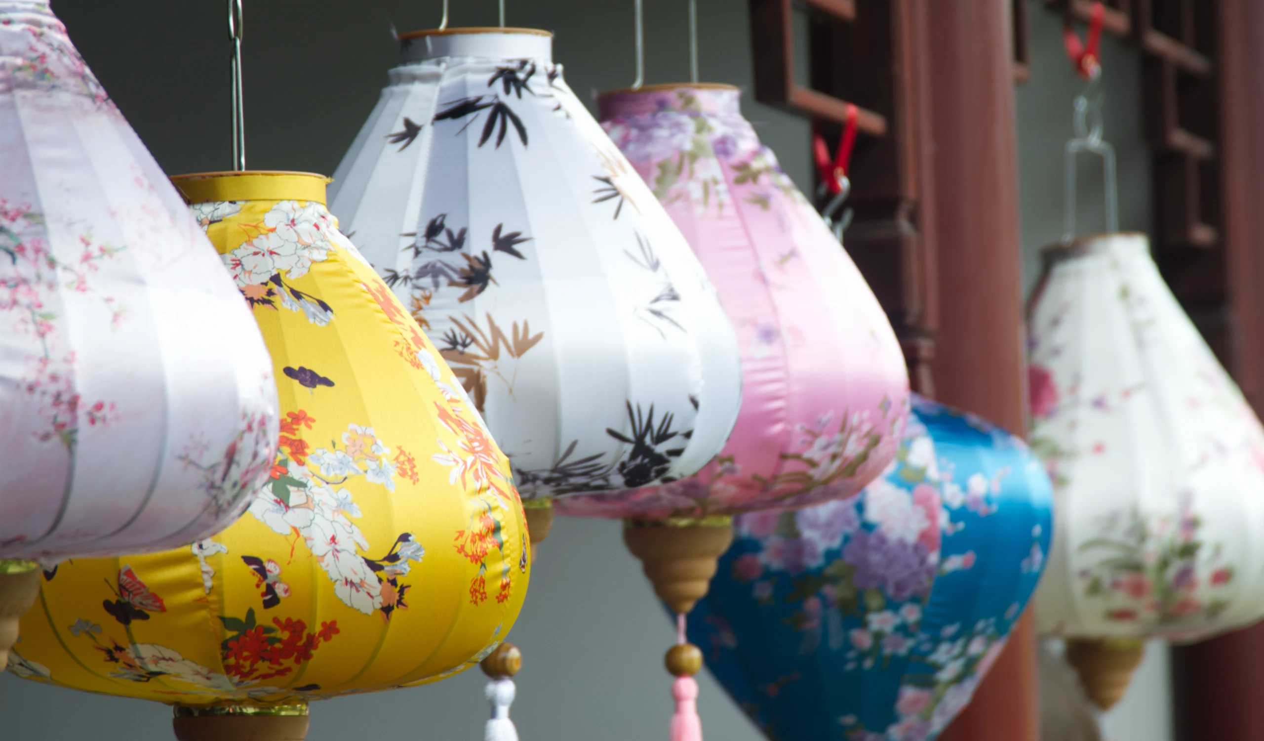 Close-up of a traditional floral and bird pattern painted lantern